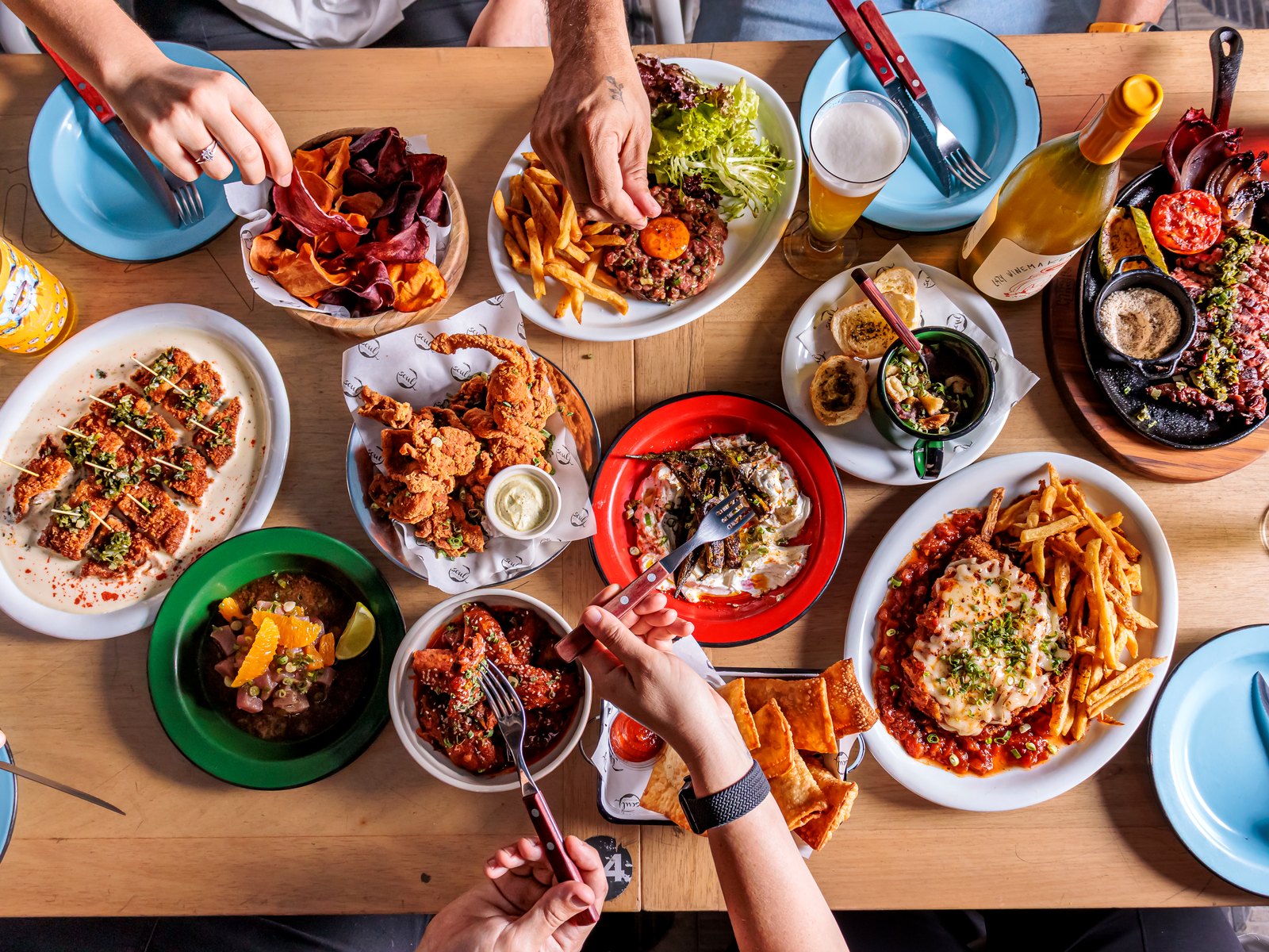 Mesa com pratos do Soul para compartilhar